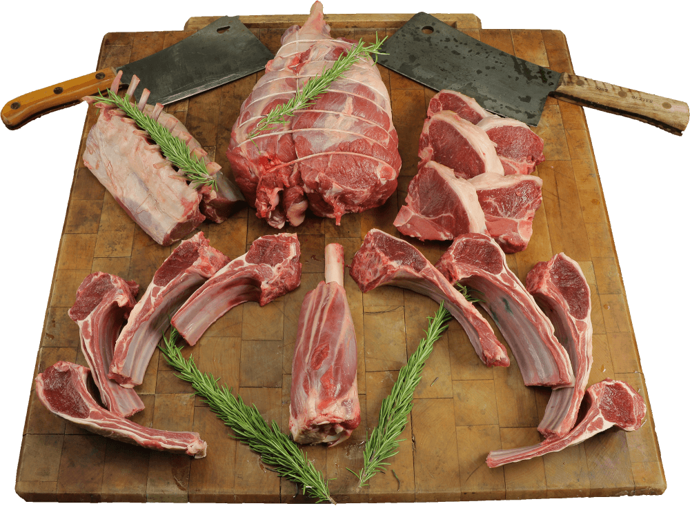 meat on butcher block with knives