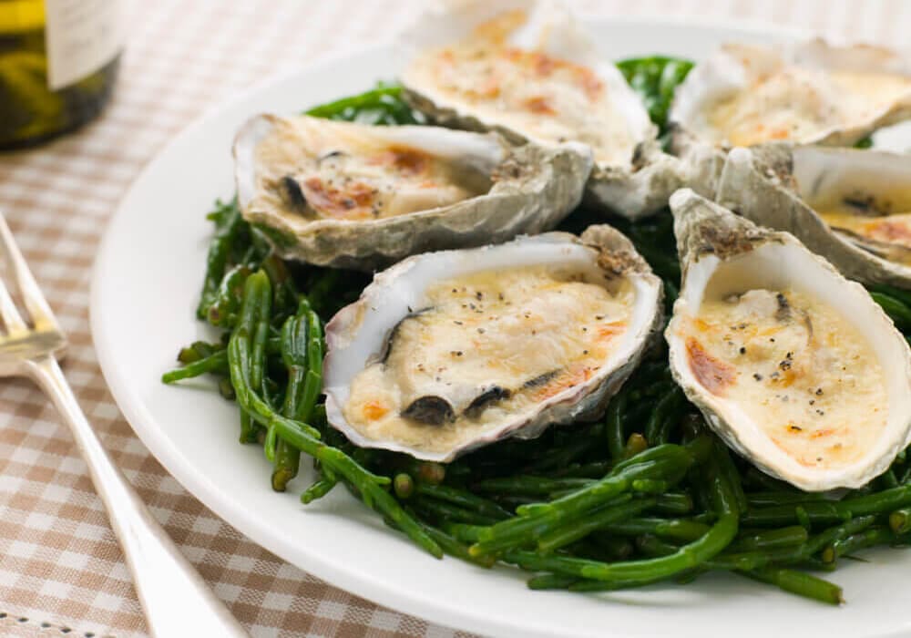 Grilled Oysters with Mornay Sauce on Samphire